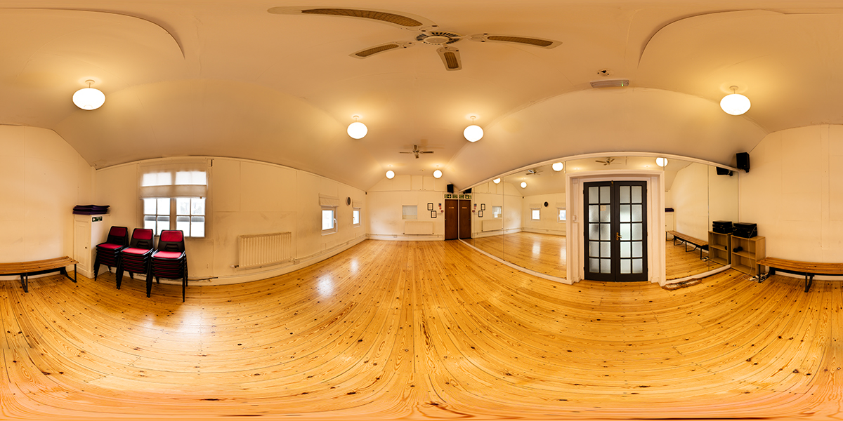 A complete 360-degree panorama of a bright rehearsal studio